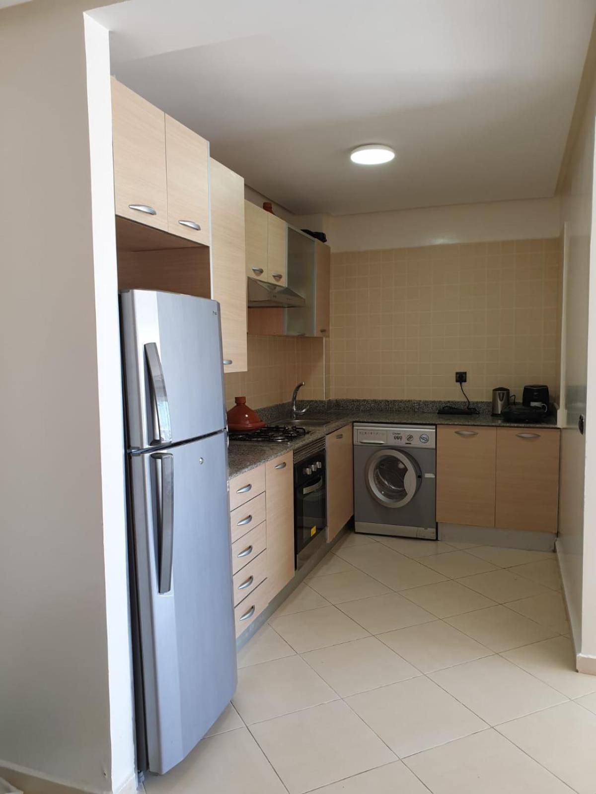 Assilah Marina Golf Chez Ahmed Apartamento Exterior foto
